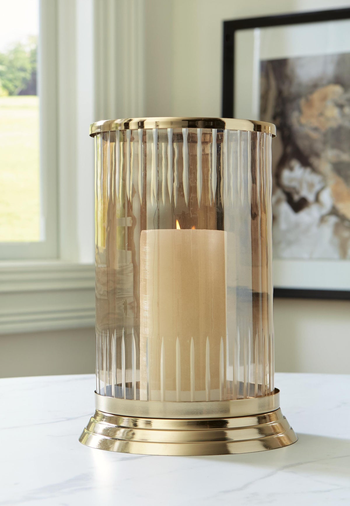 Aavinson Candle Holder - A2000687 - product view or room setting; only candle holder included (supplier image 7)