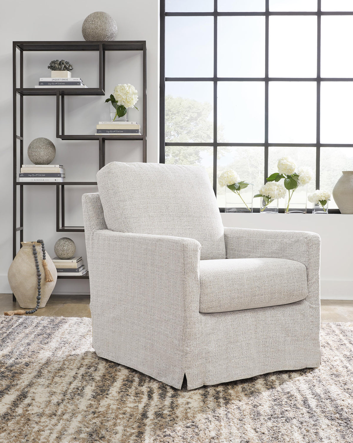 Nenana Next-Gen Nuvella Swivel Glider Accent Chair - A3000644 - product view or room setting; only accent chair included (supplier image 2)