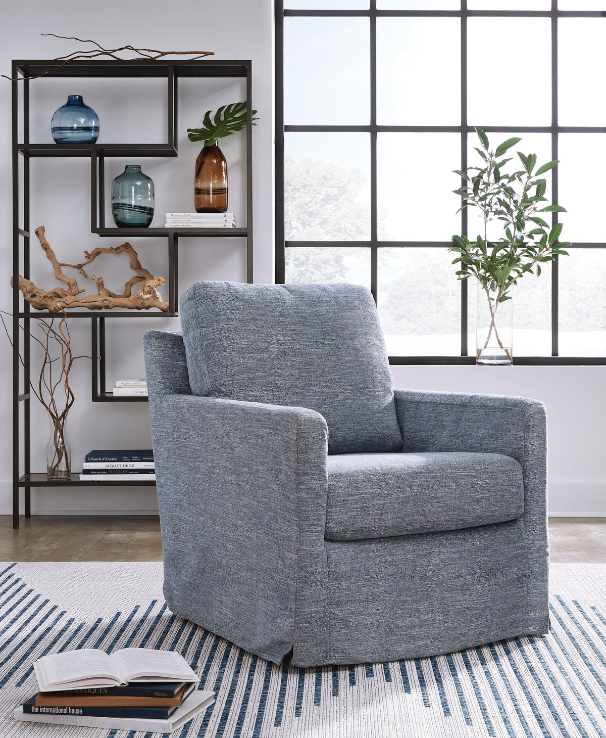 Nenana Next-Gen Nuvella Swivel Glider Accent Chair - A3000646 - product view or room setting; only accent chair included (supplier image 9)