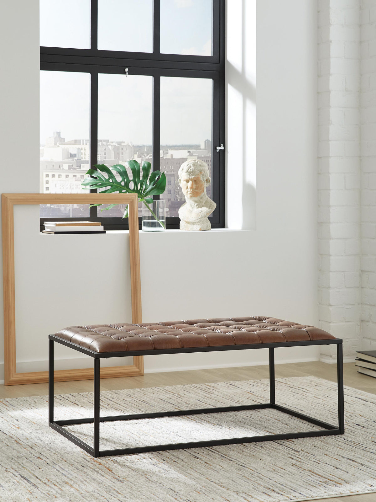 Junsor Coffee Table Ottoman - A3000826 - product view or room setting; only ottoman included (supplier image 2)