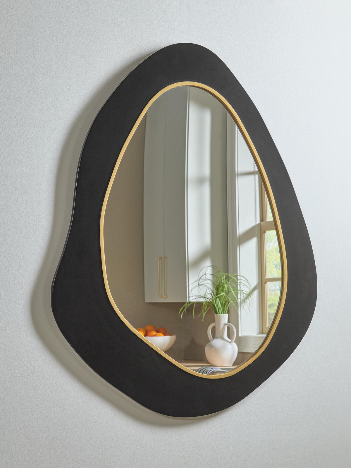 Kierlock Accent Mirror - A8010414 - product view or room setting; only mirror included (supplier image 2)