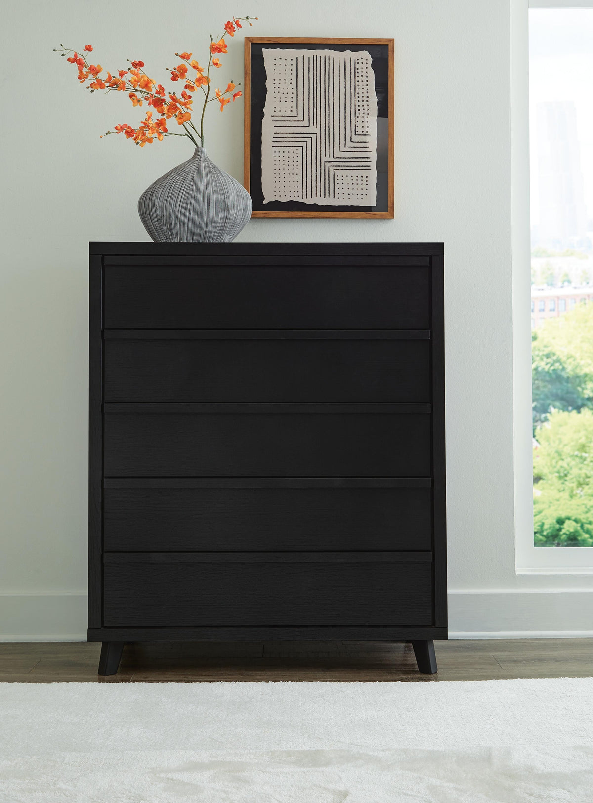 Danziar Wide Chest of Drawers - B1013-345 - product view or room setting; only chest included (supplier image 2)