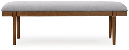 Lyncott 59" Upholstered Dining Bench - D615-00 - product view or room setting; only benche included (supplier image 3)