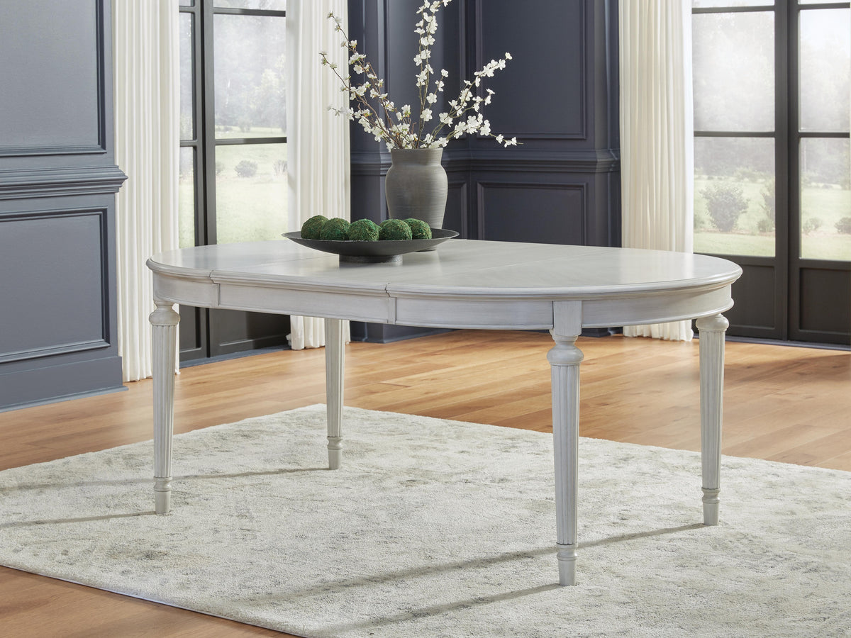 Montelaine Dining Extension Table - D795-35 - product view or room setting; only dining table included (supplier image 2)