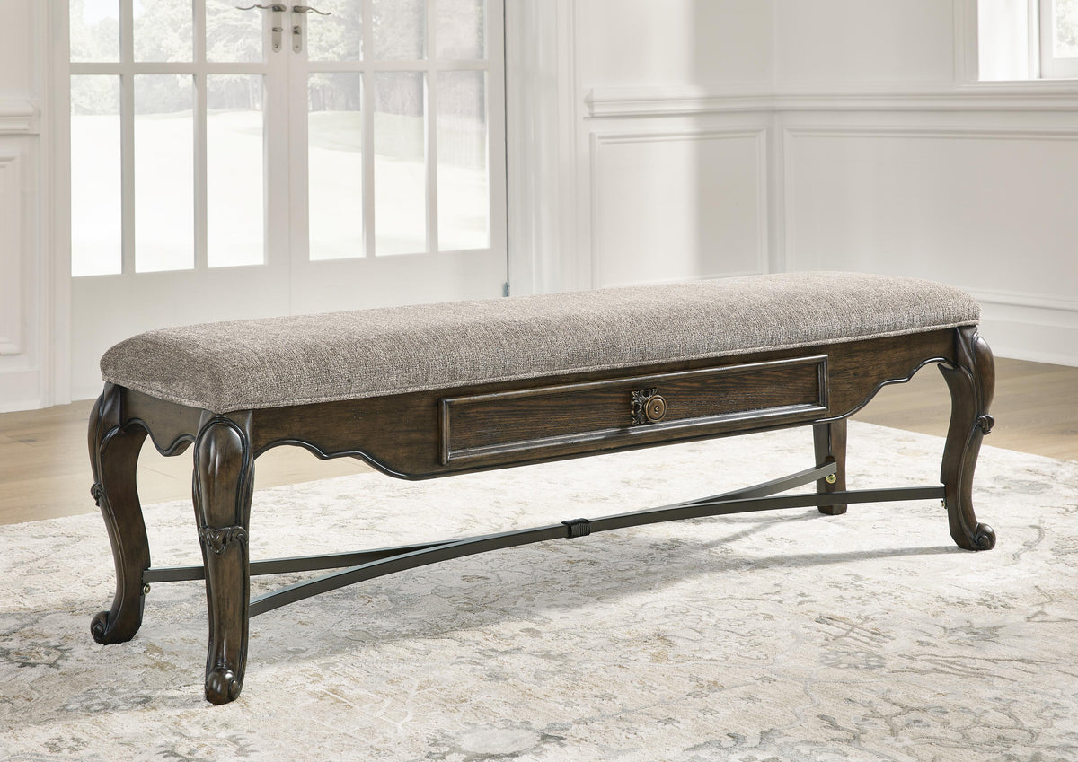 Maylee 63" Dining Bench - D947-00 - product view or room setting; only benche included (supplier image 2)