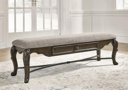 Maylee 63" Dining Bench - D947-00 - product view or room setting; only benche included (supplier image 2)