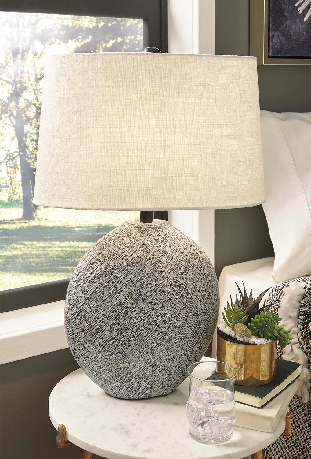Harif Table Lamp - L235624 - product view or room setting; only table lamp included (supplier image 2)