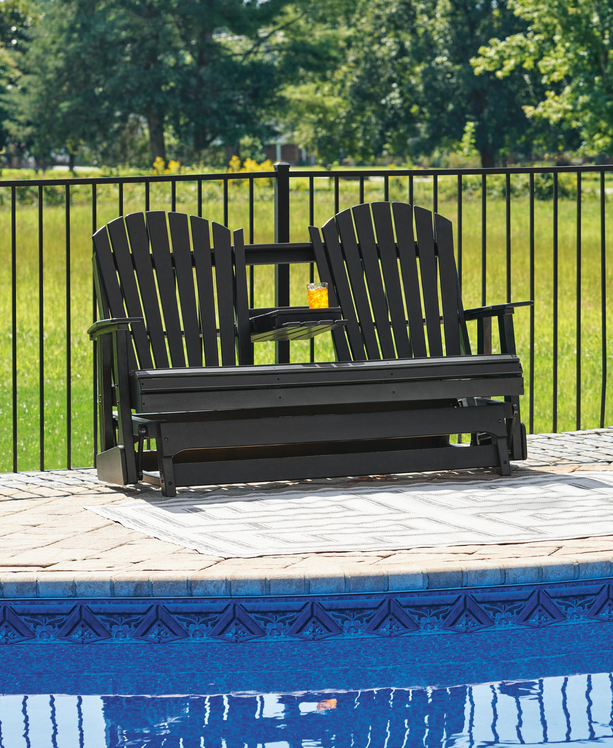 Hyland Wave Outdoor Glider Loveseat - P108-835 - product view or room setting; only outdoor loveseat included (supplier image 5)