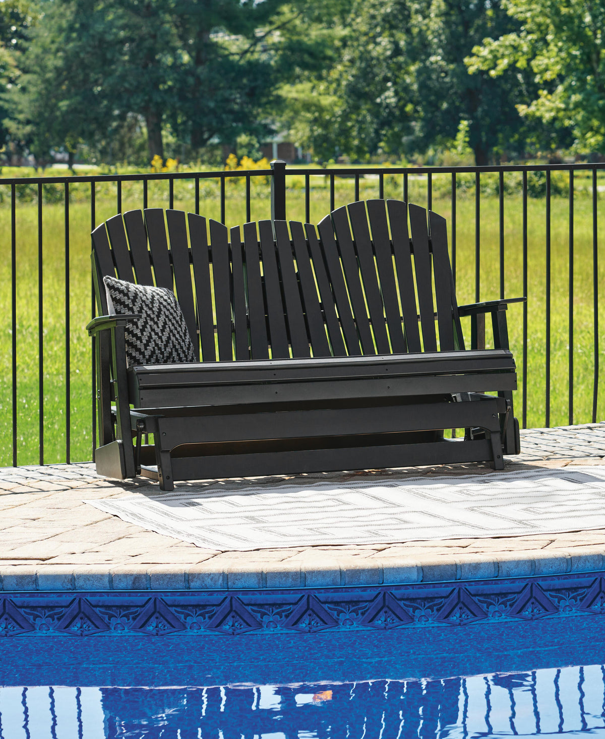 Hyland Wave Outdoor Glider Loveseat - P108-835 - product view or room setting; only outdoor loveseat included (supplier image 2)