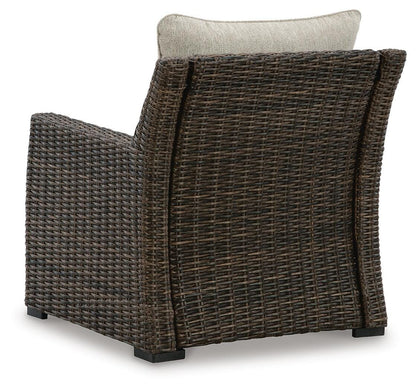 Brook Ranch Outdoor Lounge Chair with Cushion - P465-820 - product view or room setting; only outdoor lounge chair included (supplier image 5)