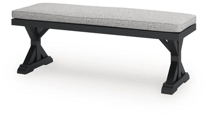 Beachcroft Outdoor Bench with Cushion - P792-600 - product view or room setting; only outdoor dining benche included (supplier image 3)