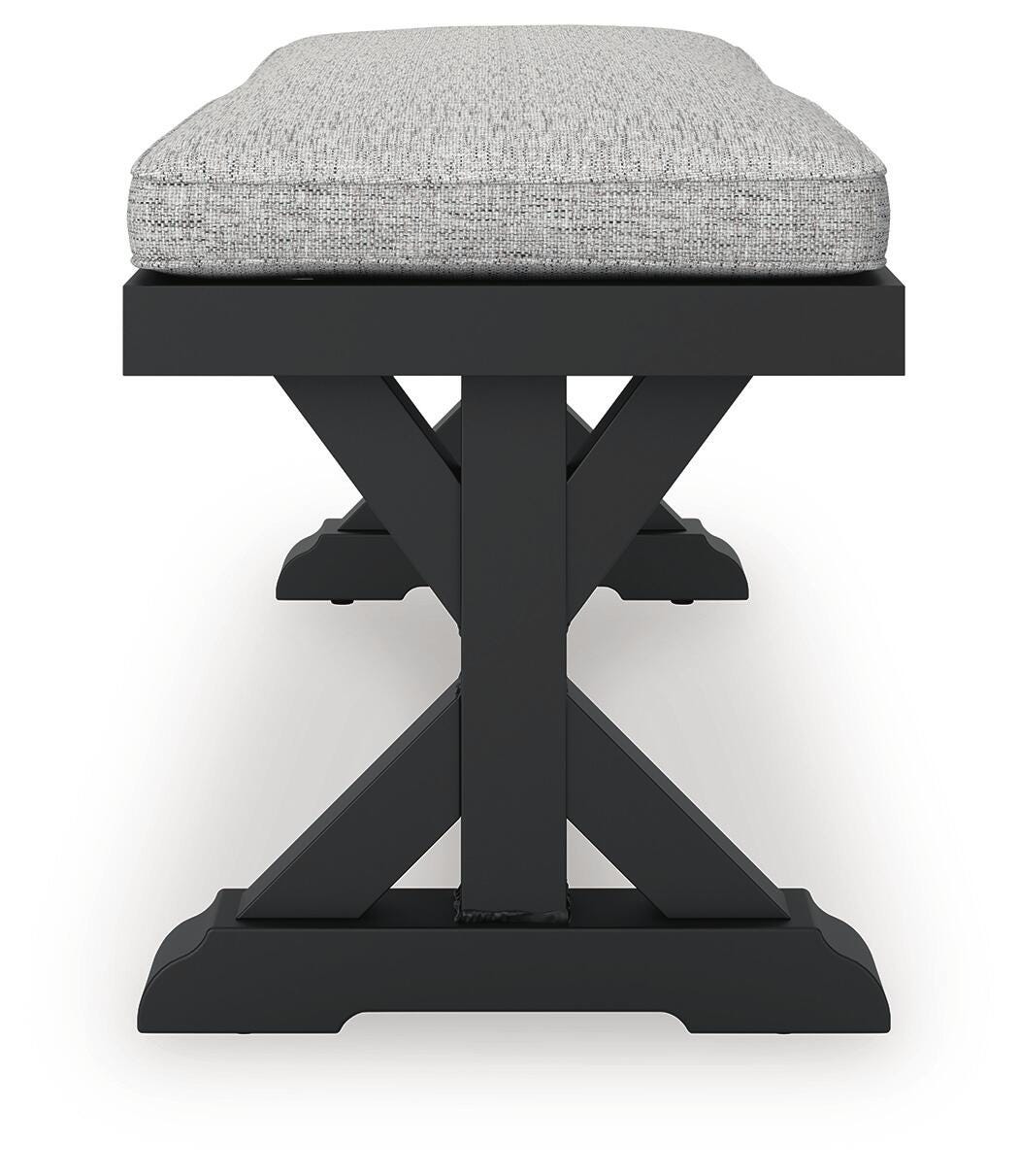 Beachcroft Outdoor Bench with Cushion - P792-600 - product view or room setting; only outdoor dining benche included (supplier image 6)