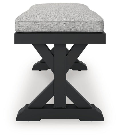 Beachcroft Outdoor Bench with Cushion - P792-600 - product view or room setting; only outdoor dining benche included (supplier image 6)