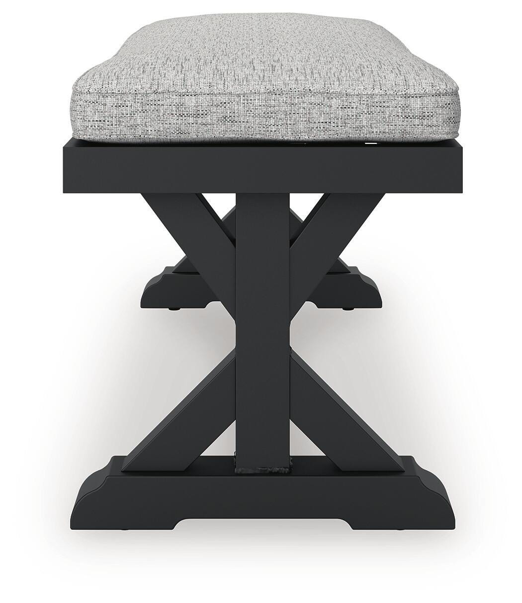 Beachcroft Outdoor Bench with Cushion - P792-600 - product view or room setting; only outdoor dining benche included (supplier image 7)
