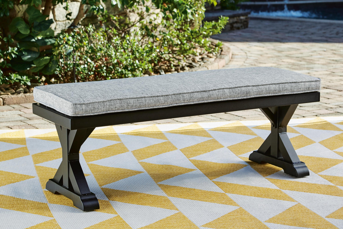 Beachcroft Outdoor Bench with Cushion - P792-600 - product view or room setting; only outdoor dining benche included (supplier image 2)