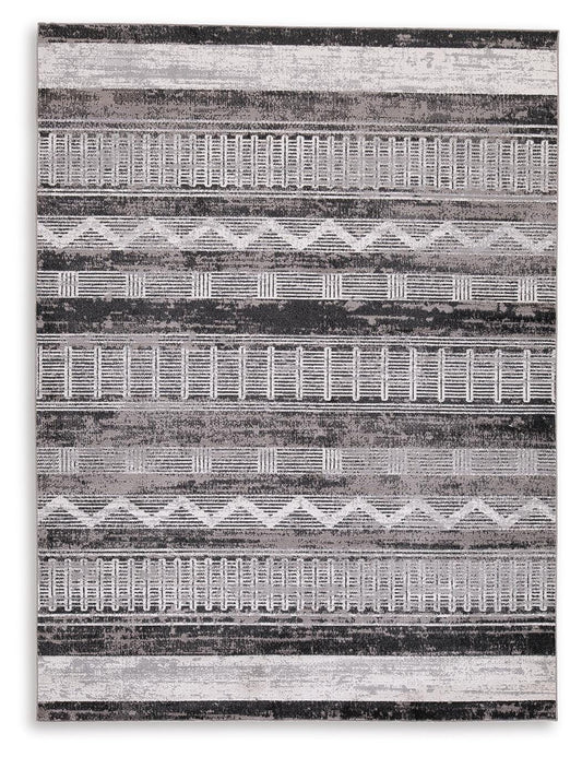 Henchester Area Rug - R405992 - product view or room setting; only area rug included (supplier image 1)