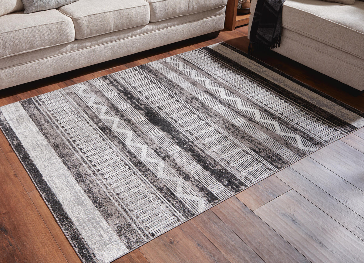 Henchester Area Rug - R405992 - product view or room setting; only area rug included (supplier image 2)