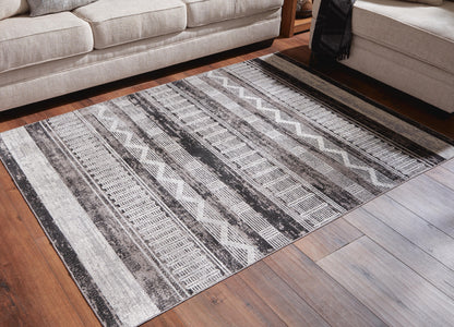 Henchester Area Rug - R405992 - product view or room setting; only area rug included (supplier image 2)