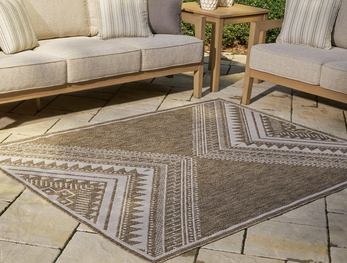 Dunsler Area Rug - R900012, R900011 - product view or room setting; only area rug included (supplier image 2)