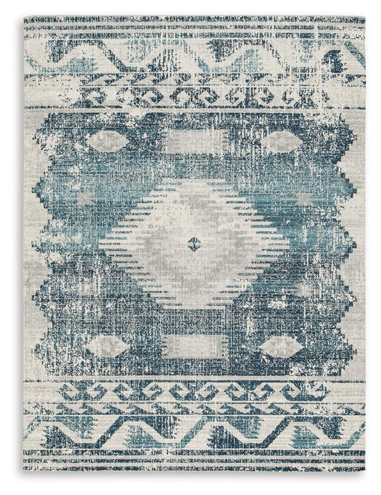 Daddridge Area Rug - R900102, R900101 - product view or room setting; only area rug included (supplier image 1)