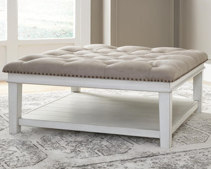 Kanwyn Upholstered Ottoman Coffee Table - T937-21 - product view or room setting; only coffee table included (supplier image 2)
