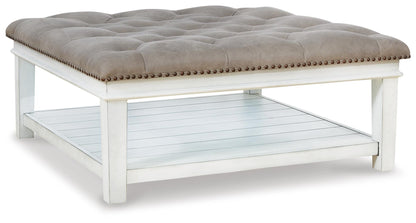 Kanwyn Upholstered Ottoman Coffee Table - T937-21 - product view or room setting; only coffee table included (supplier image 1)