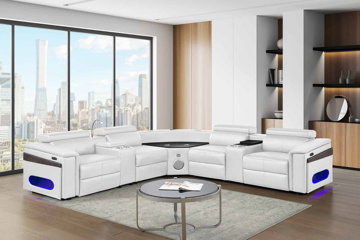 Nova White modular sectional shown in a room scene with two consoles.