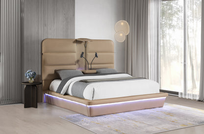 Futura Caramel Bed - staged bed with deployed console and device holders. Shared supplier photo; photographed size is not verified.