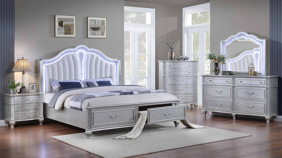 Mystic Silver room scene with storage bed, dresser, dresser mirror, chest and one nightstand. Photographed bed size is not verified.