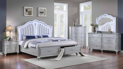 Mystic Silver room scene with storage bed, dresser, dresser mirror, chest and one nightstand. Photographed bed size is not verified.