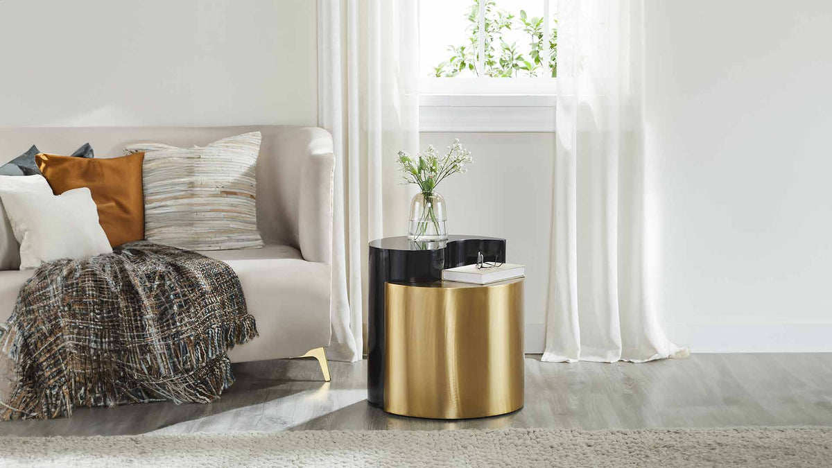 Ying Yang Black & Gold End Table in a furnished room setting.