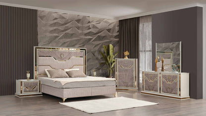 Omary Beige room scene with bed, dresser, dresser mirror, chest and one clearly visible nightstand. Photographed bed size is not verified.
