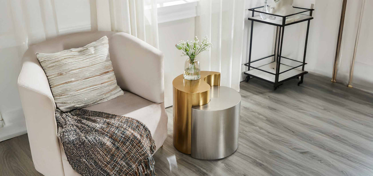 Ying Yang Gold & Silver End Table in a furnished room setting.