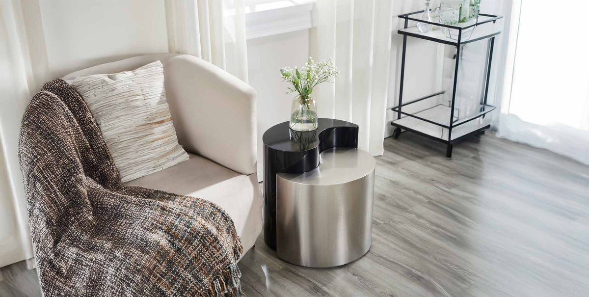 Ying Yang Black & Silver End Table in a furnished room setting.