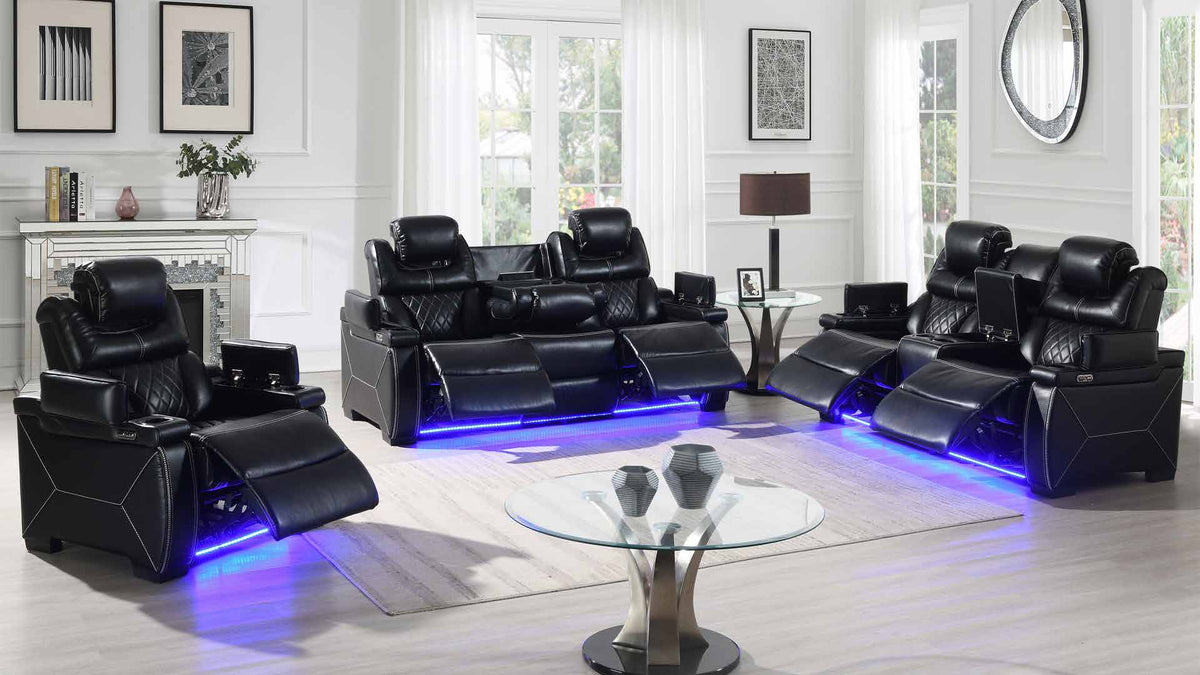 Lexus Black collection room scene showing the chair at left, sofa at center and loveseat at right, with other room furniture and decorative accessories.