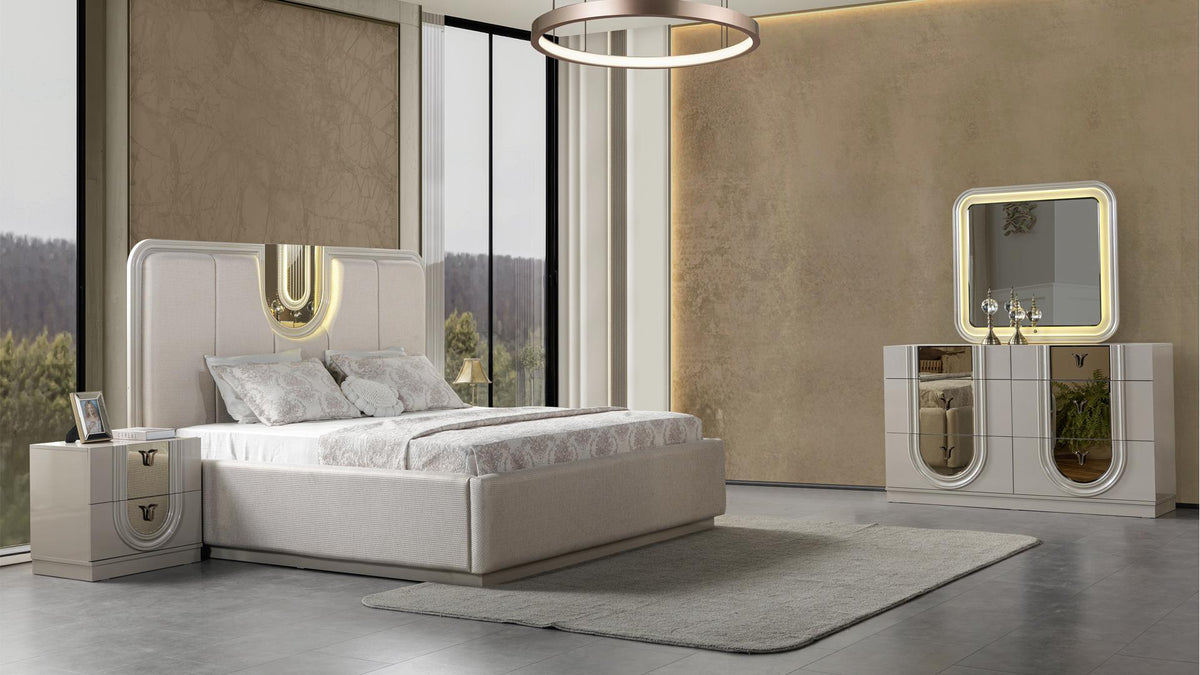 Lesli Beige 4-piece bedroom collection with one nightstand; photographed bed size illustrative; second nightstand included only when selected and not shown